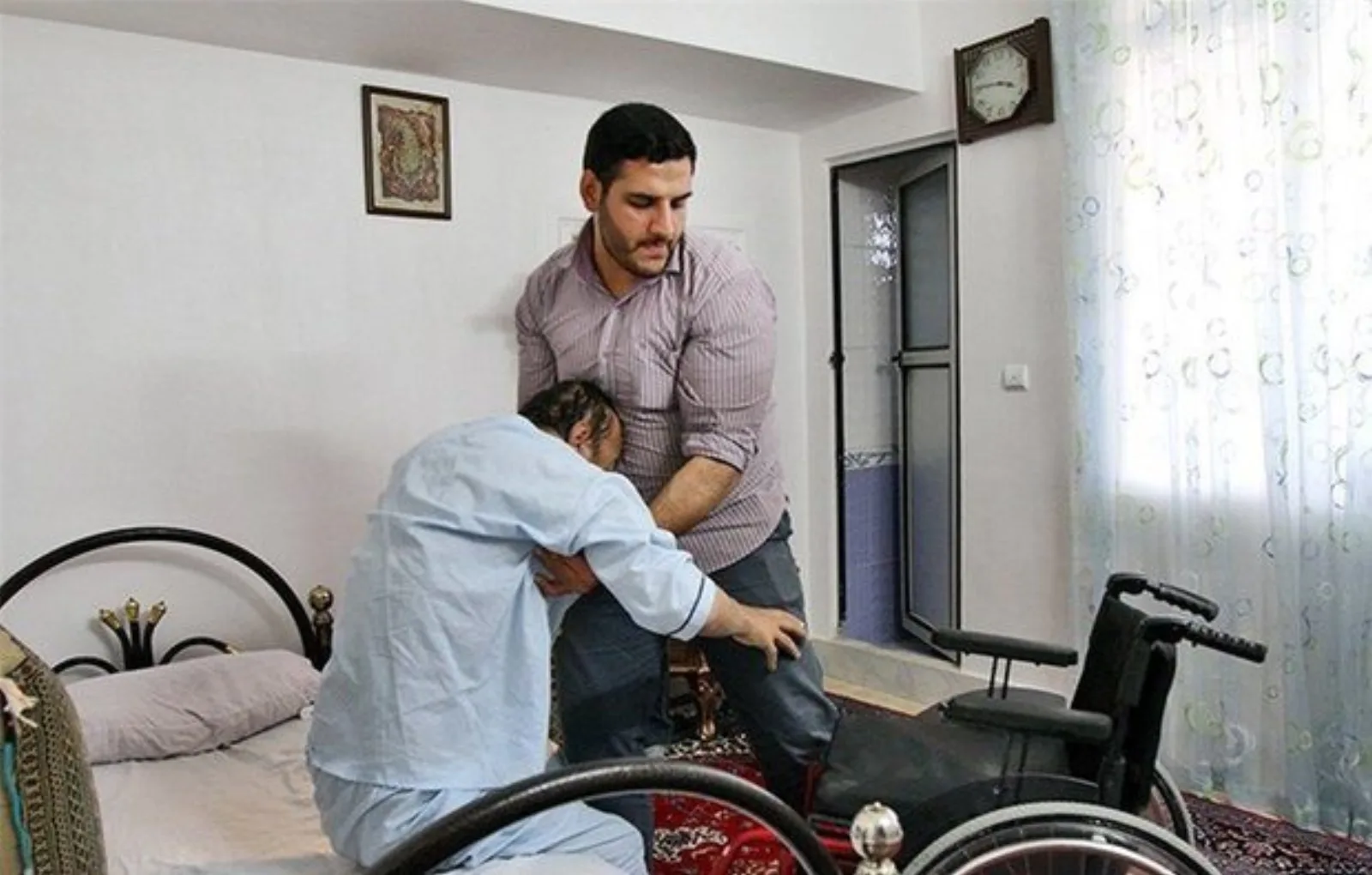 پدر و ویلچر