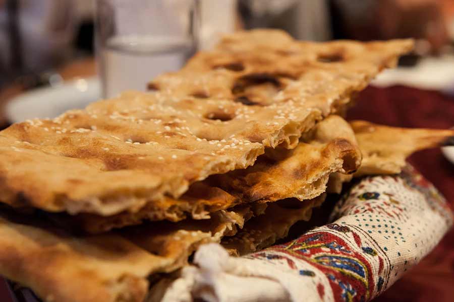 ارسال نان سنگک درب منزل با سرویس نانوایی آنلاین اسنپ فود